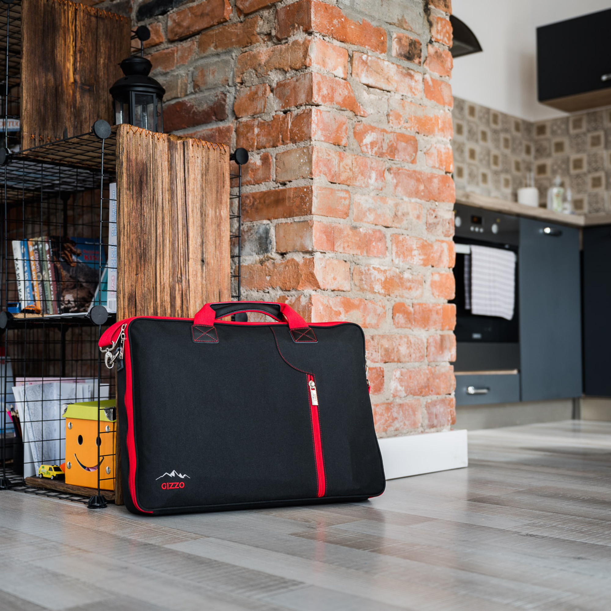 small portable grill with travel friendly case of laptop