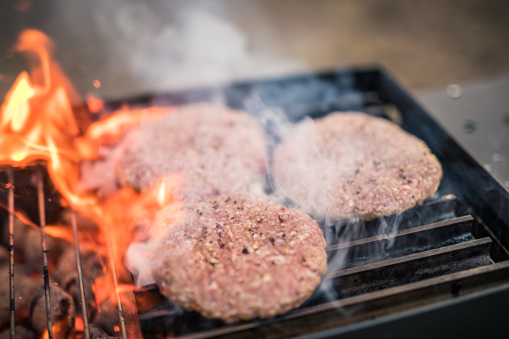 Grilling burgers on grillgrate